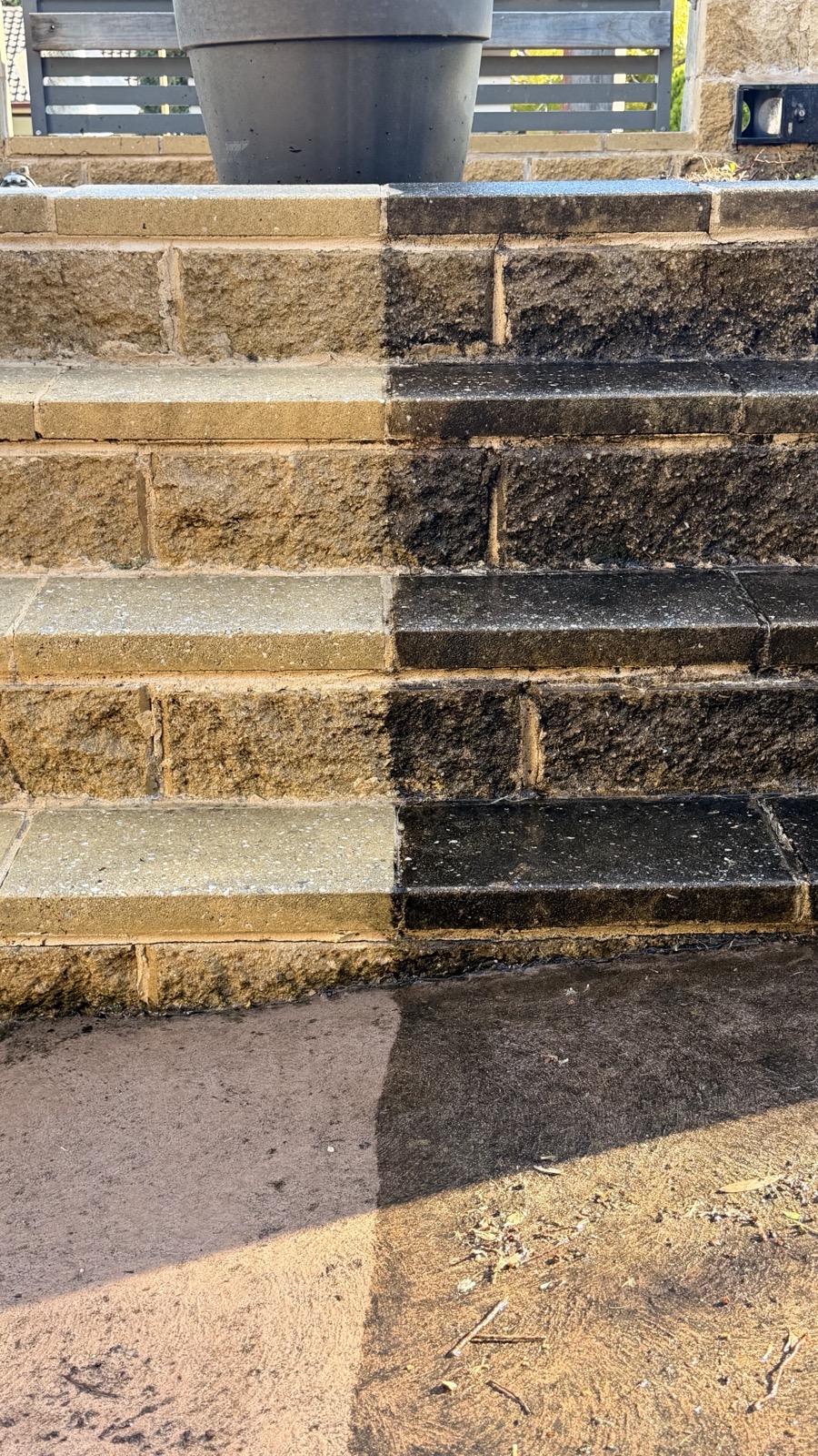 Sandstone steps half cleaned showing transformation